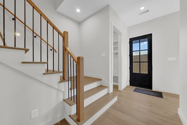 foyer with light wood-type flooring