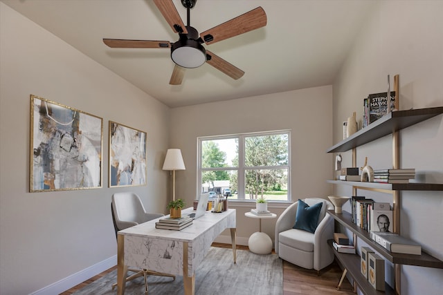 office space featuring ceiling fan and wood-type flooring