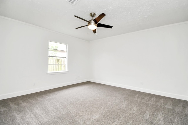 unfurnished room featuring crown molding, carpet floors, a textured ceiling, and ceiling fan