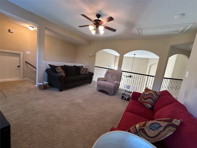 living room with carpet flooring and ceiling fan