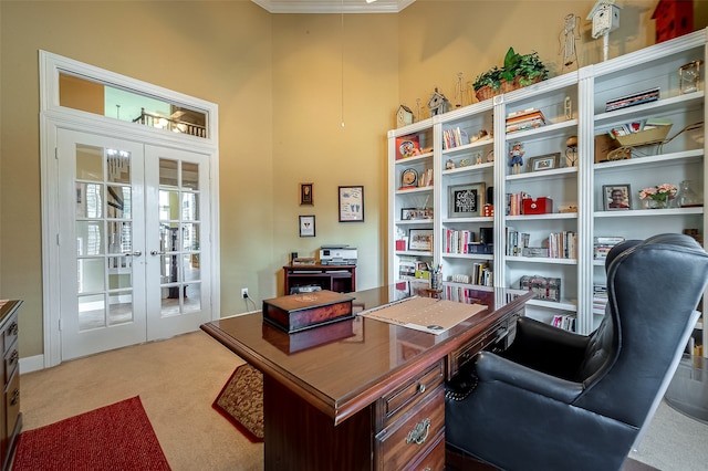 office space with ornamental molding, light carpet, and french doors