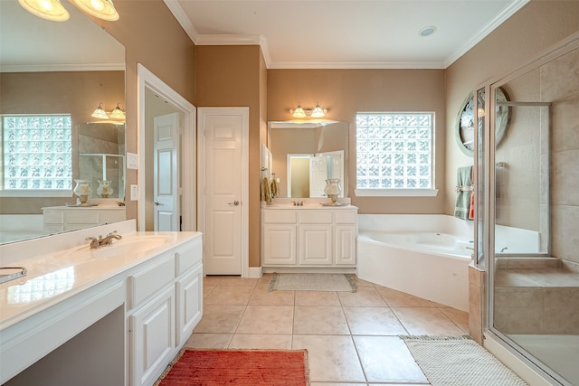 bathroom with tile patterned flooring, vanity, ornamental molding, and shower with separate bathtub