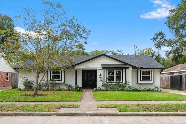 view of front of house with a front lawn