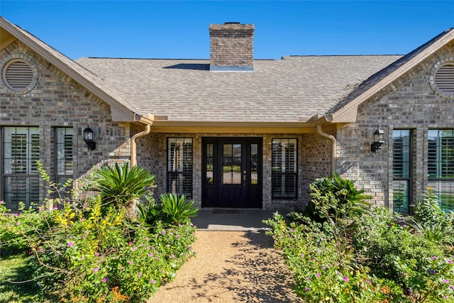 property entrance featuring french doors