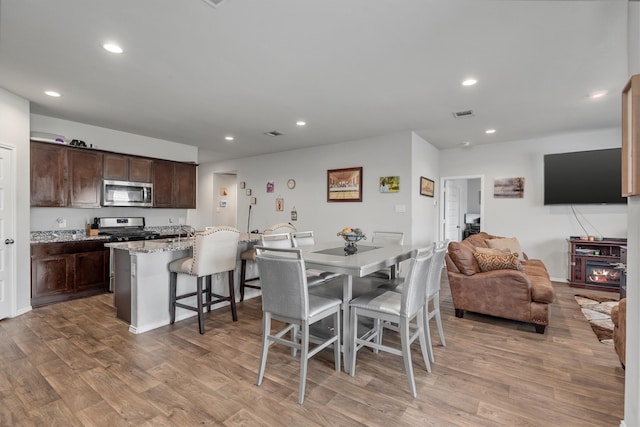 dining area featuring light hardwood / wood-style floors