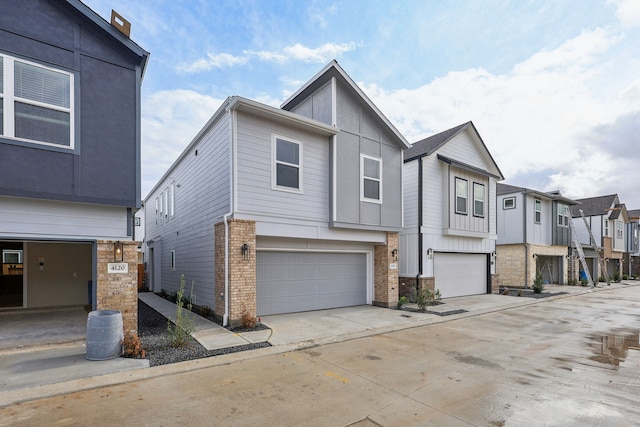 townhome / multi-family property featuring a garage