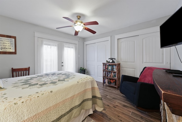 bedroom featuring multiple closets, ceiling fan, french doors, and dark wood-type flooring