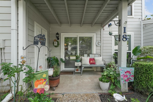 property entrance featuring a porch