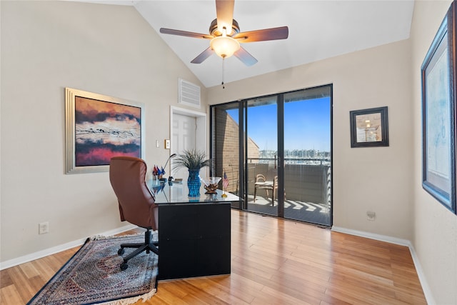 office with ceiling fan, high vaulted ceiling, and light hardwood / wood-style floors