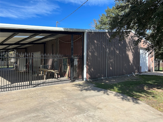 view of gate with a carport