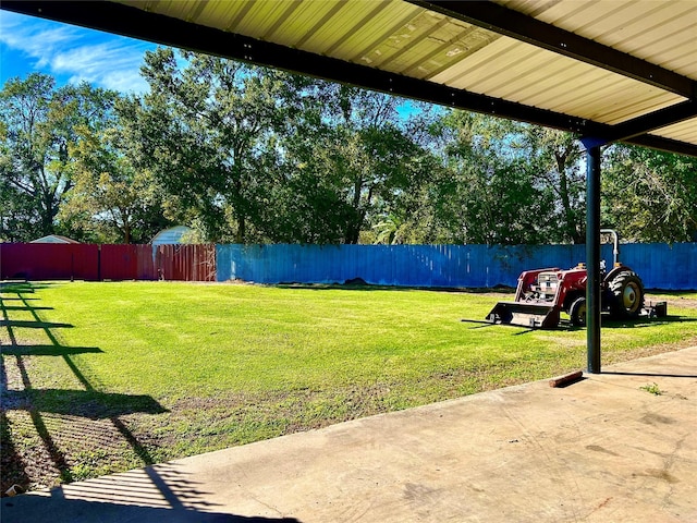 8766 Beauxart Garden Rd, Beaumont, TX 77705 - view of yard featuring a fenced backyard and a patio