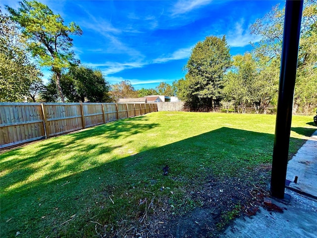 8766 Beauxart Garden Rd, Beaumont, TX 77705 - view of yard featuring a fenced backyard