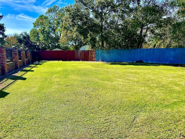 8766 Beauxart Garden Rd, Beaumont, TX 77705 - view of yard featuring fence