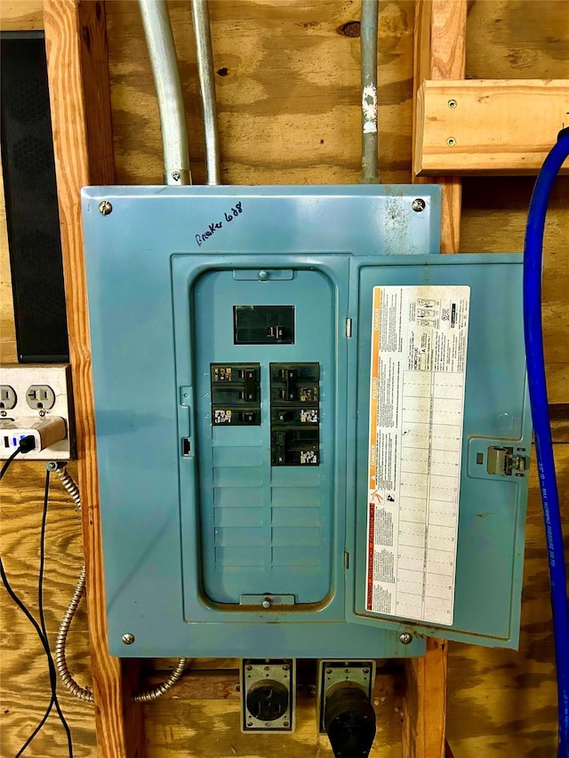 8766 Beauxart Garden Rd, Beaumont, TX 77705 - utility room featuring electric panel