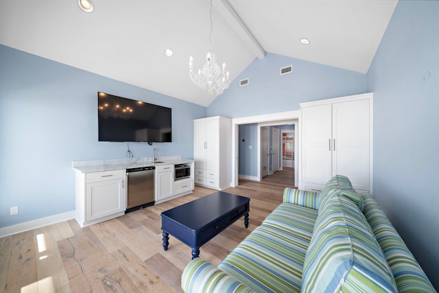 living room featuring beamed ceiling, light wood-type flooring, high vaulted ceiling, and indoor wet bar