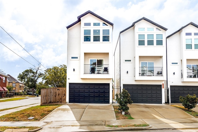 townhome / multi-family property featuring a garage