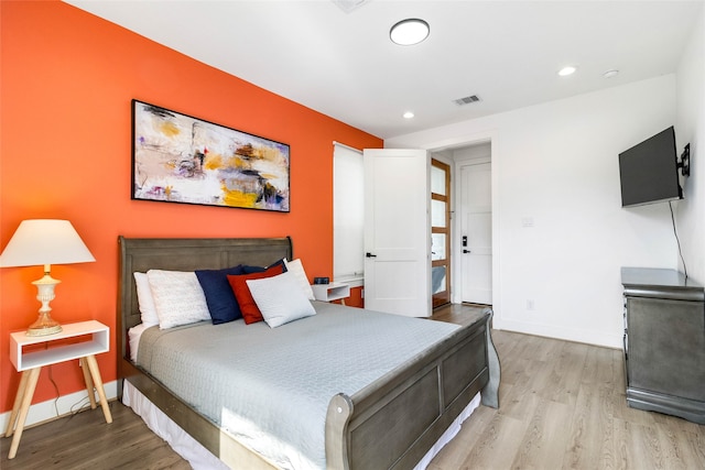 bedroom featuring light hardwood / wood-style flooring