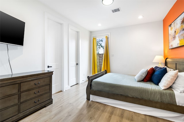 bedroom featuring light wood-type flooring