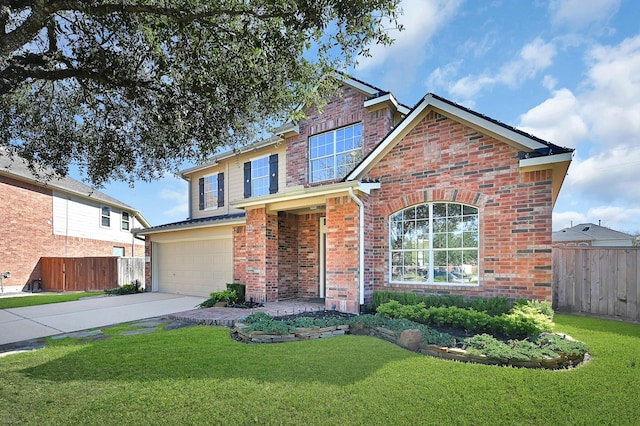 view of front facade with a front yard and a garage