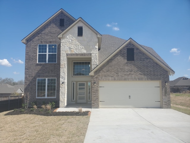 view of front of house with a garage and brick siding