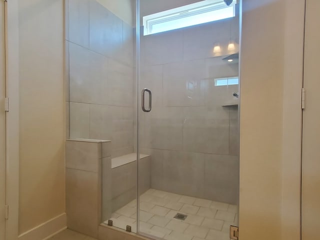 full bath featuring a stall shower