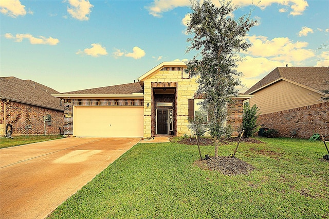 view of front of property with a front lawn and a garage