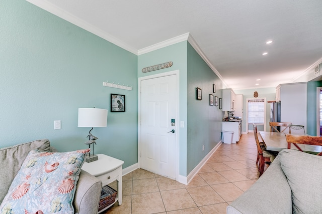 living room with light tile patterned floors and crown molding