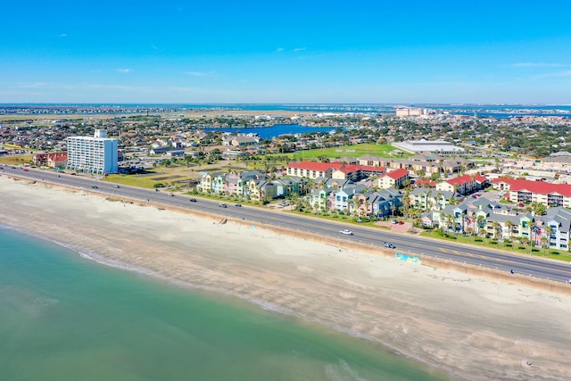 aerial view with a water view and a view of the beach