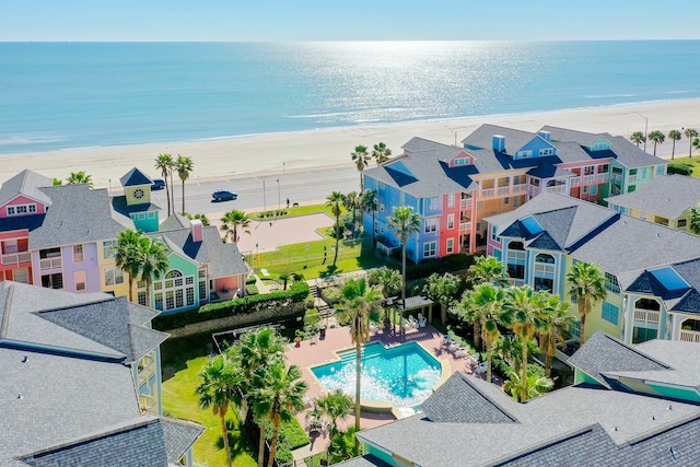 aerial view with a view of the beach and a water view