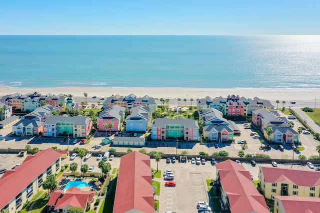 bird's eye view featuring a beach view and a water view