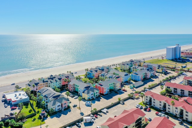 aerial view featuring a water view and a beach view