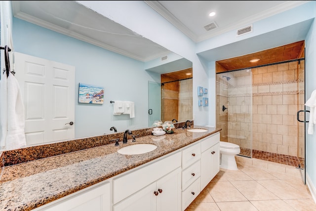 bathroom with tile patterned floors, a shower with shower door, and ornamental molding