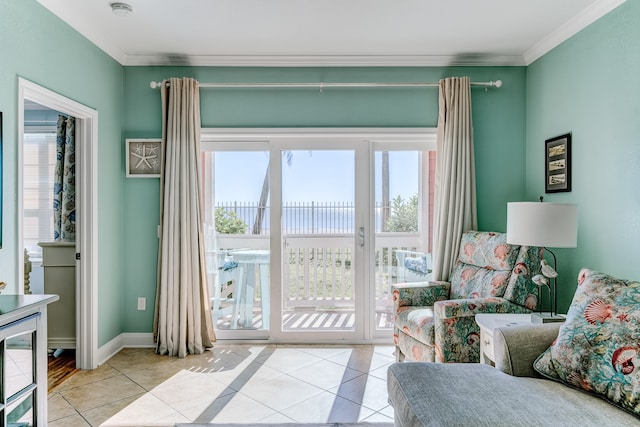 doorway to outside featuring light tile patterned floors and crown molding