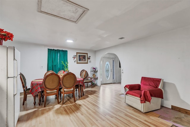 dining room featuring light hardwood / wood-style floors