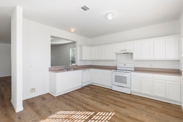 kitchen featuring white cabinets, light wood-type flooring, white appliances, and sink