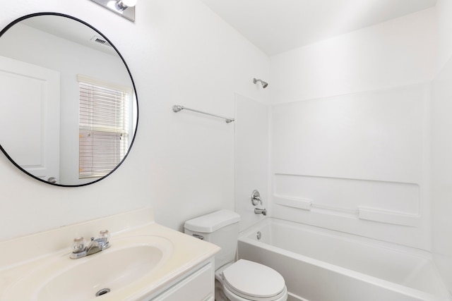 full bathroom with vanity, toilet, and shower / tub combination