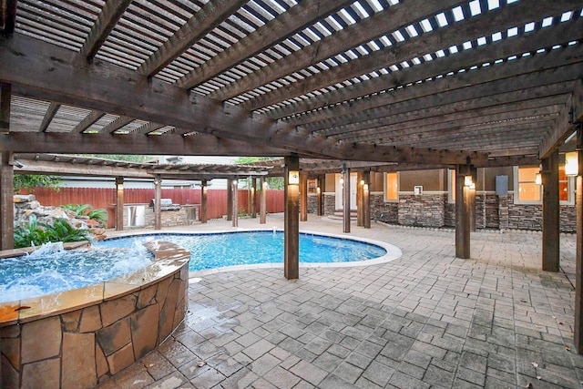 view of swimming pool with a patio area and a pergola