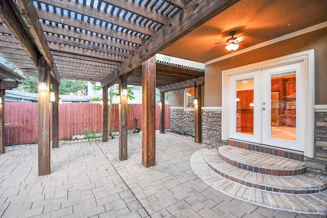 view of patio / terrace featuring french doors, a pergola, and ceiling fan