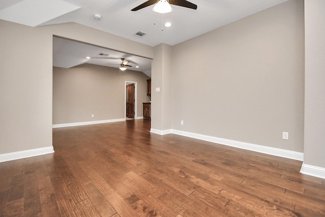 empty room featuring hardwood / wood-style floors, ceiling fan, and lofted ceiling