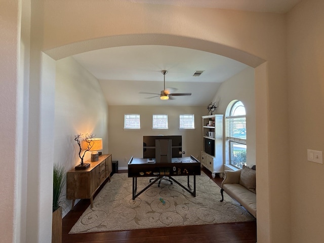 office area with hardwood / wood-style floors, ceiling fan, and vaulted ceiling