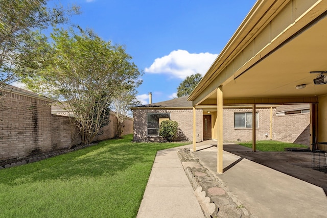 view of yard with a patio area