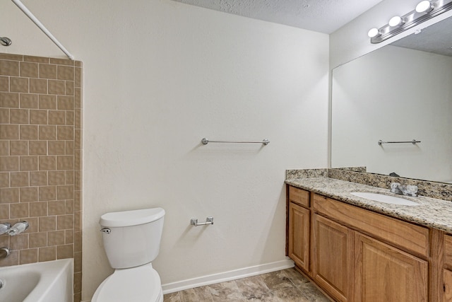 full bathroom featuring shower / washtub combination, vanity, a textured ceiling, and toilet