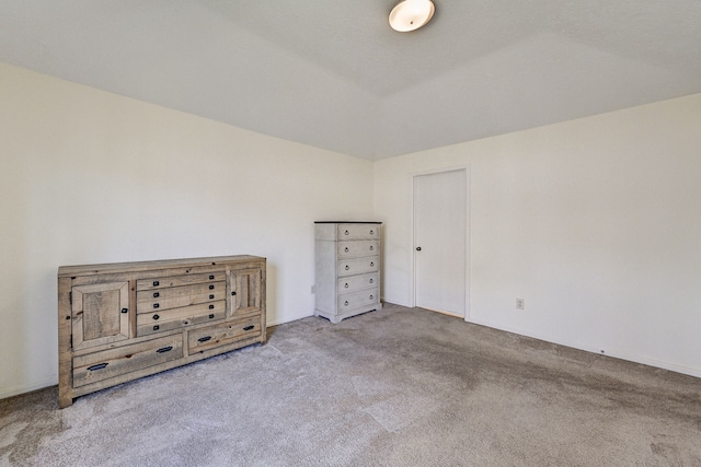 unfurnished bedroom featuring light colored carpet