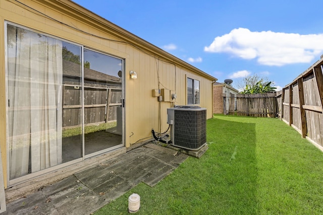 view of yard featuring central AC unit