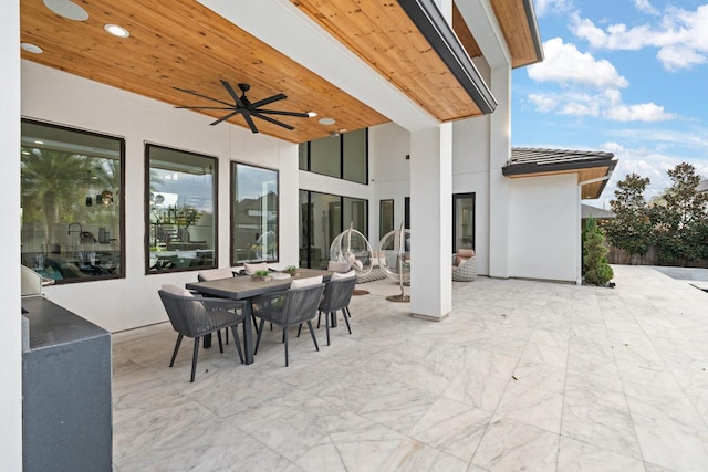 view of patio / terrace featuring ceiling fan