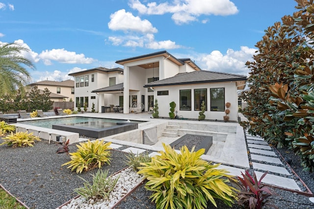 back of house featuring a patio