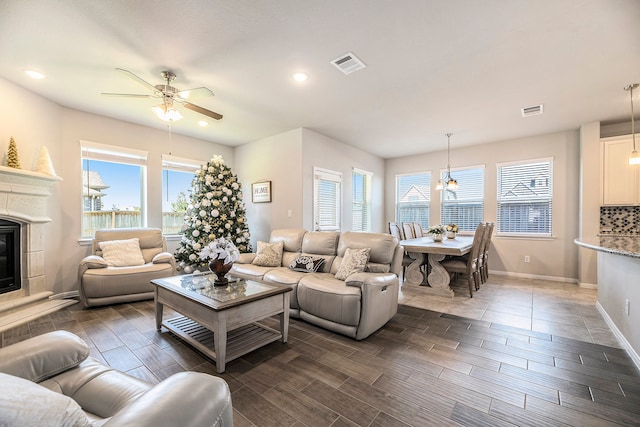 living room featuring ceiling fan