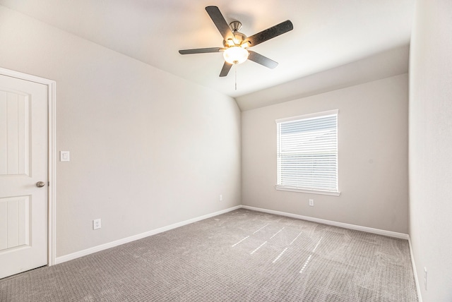 spare room with carpet flooring and ceiling fan