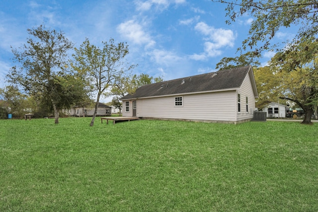 exterior space with a yard and a wooden deck