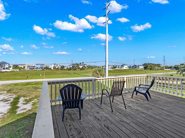 deck featuring a lawn